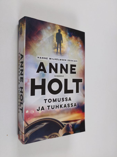 Anne Holt : Tomussa ja tuhkassa
