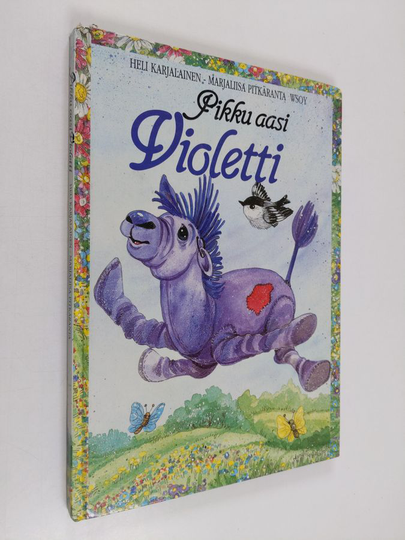 Heli Karjalainen : Pikku aasi Violetti