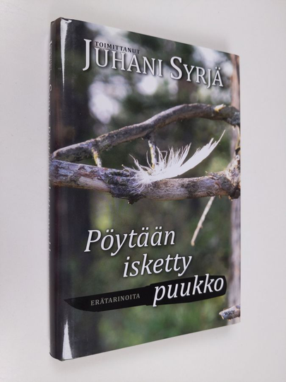 Juhani Syrjä (toim.) : Pöytään isketty puukko : erätarinoita