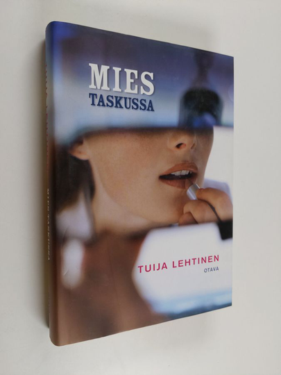 Tuija Lehtinen : Mies taskussa