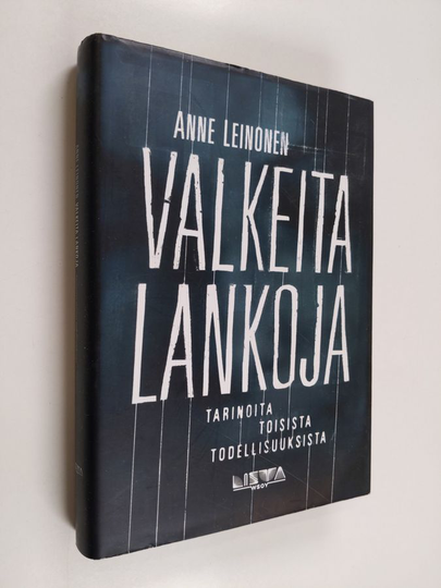 Anne Leinonen : Valkeita lankoja : tarinoita toisista todellisuuksista