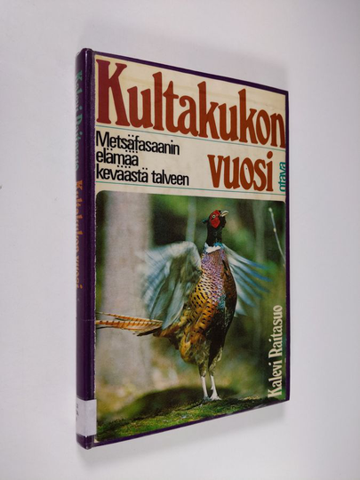 Kalevi Raitasuo : Kultakukon vuosi : metsäfasaanin elämää keväästä talveen