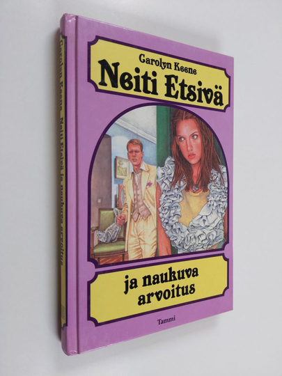 Carolyn Keene : Neiti Etsivä ja naukuva arvoitus